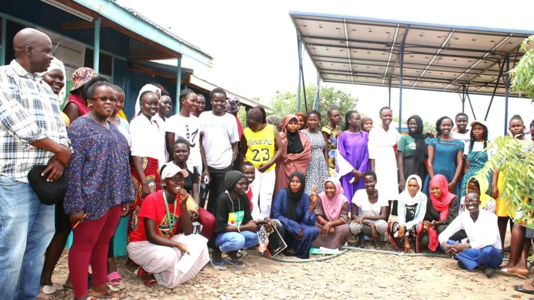 Young women in Kenya attend a mentorship session to learn best practices in online work.